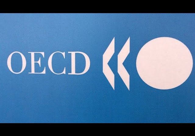 OECD Sees Global Economy Jolted by War in Ukraine